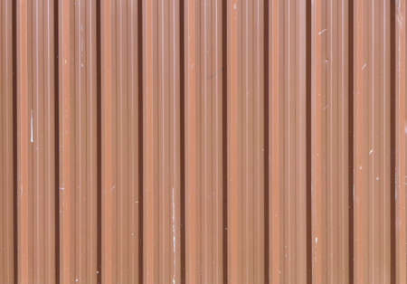 Brown metal sheet texture, Brown zinc background with vertical stripesの写真素材