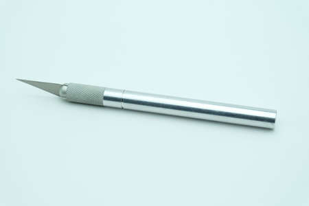 Paper cutting knife isolated on white backgroundの写真素材