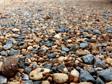 Field of moist pebble, rock, stone close upの写真素材