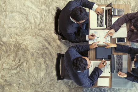 Business People Meeting working in office for discussing documents and ideas , with soft focus, vintage toneの写真素材