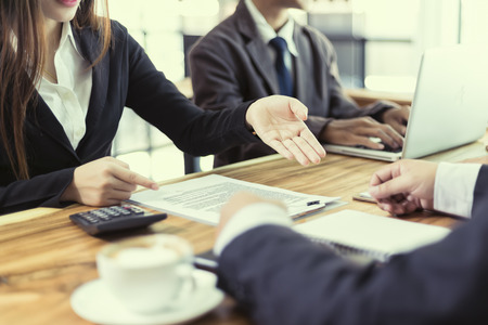 Business People Meeting working in office for discussing documents and ideas , with soft focus, vintage toneの写真素材