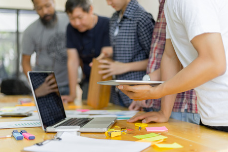 business people discussing together in meeting room, business concept, teamwork conceptの写真素材