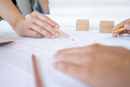 Engineer sketching architectural project on blueprint, engineering concept, architectural conceptの写真素材