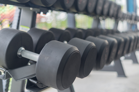 Fitness background with dumbbells in gym, fitness concept, sport conceptの写真素材