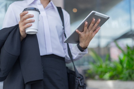 modern business woman working with tablet outdoor, business conceptの写真素材