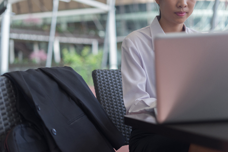 modern business woman working with laptop outdoor, business conceptの写真素材