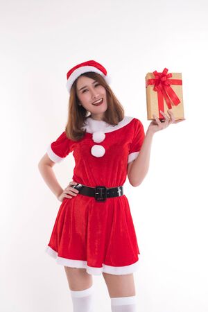 happy woman wearing santa dress on white background, christmas conceptの写真素材