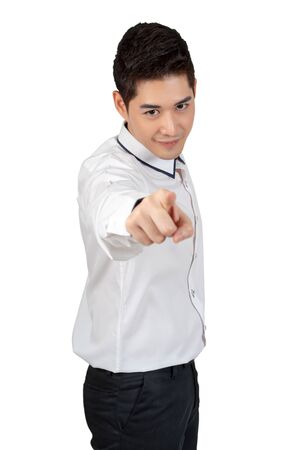 Happy young businessman in suit looking at camera on white background, isolated conceptの写真素材