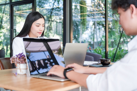 business people meeting brainstorming and discussing project together in office, teamwork conceptの写真素材