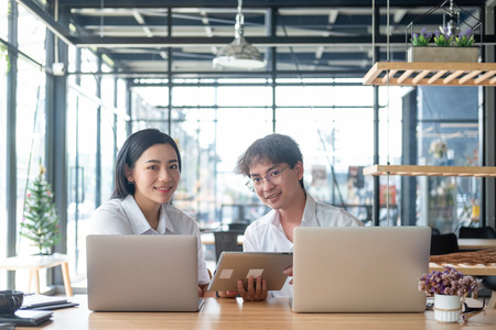 business people meeting brainstorming and discussing project together in office, teamwork conceptの写真素材