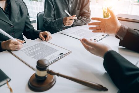 smart lawyer review and give advice to clients in the office before considering the judgment, lawyer conceptの写真素材