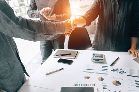 Business people partners shaking hands after complete agreement plan in meeting room, investment concept, success conceptの写真素材
