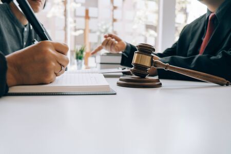 smart lawyer review and give advice to clients in the office before considering the judgment, lawyer...