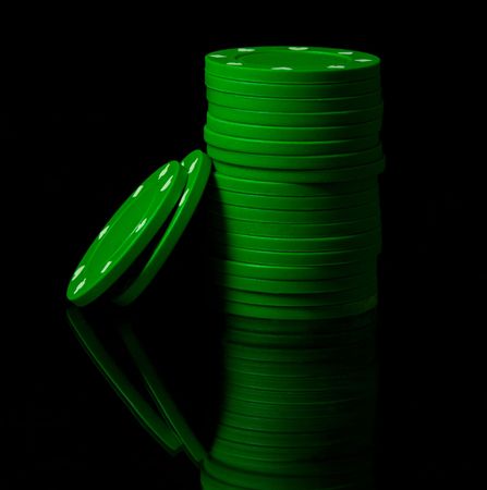 Gambling chips on black background の写真素材