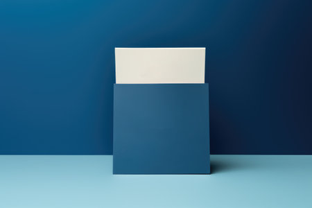Simple image of blue and white box placed on blue surface. This versatile picture can be used for various purposes.の素材