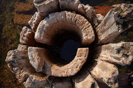 Water-worn rocks creating a natural portal or cave entrance.の写真素材