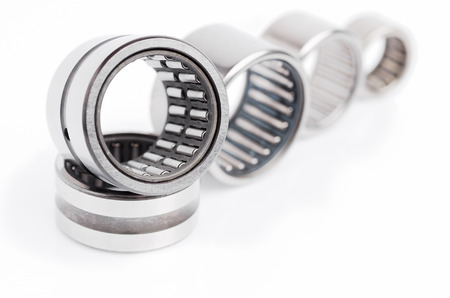 Needle roller bearings in various sizes isolated on whiteの写真素材