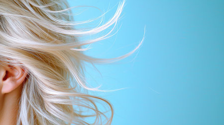 A close-up of platinum blonde hair with a smooth and flowing texture, showing creative and elegant hair coloring.の素材