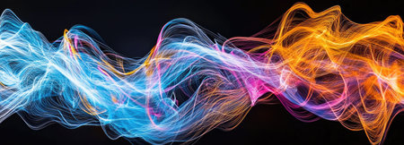 A vibrant and energetic display of neon light streaks in blue, orange, and pink, forming a swirling motion pattern.の素材