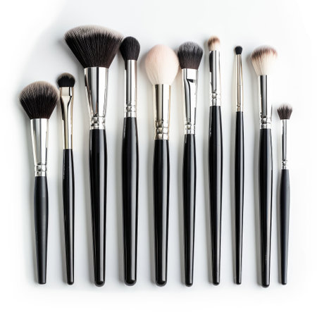 Luxurious and stylish professional makeup brushes isolated neatly on a white background.の素材