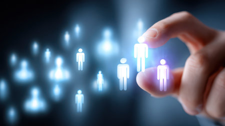 A hand reaches out to select a brightly glowing digital human icon from a group of blurred icons, symbolizing customer focus, selecting a target audience, or highlighting a key individual in a customer relationship management system. This image is perfect for marketing, HR, and business strategy content.の素材