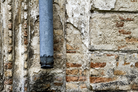 Old grunge brick and concrete weathered grunge wall textured background.