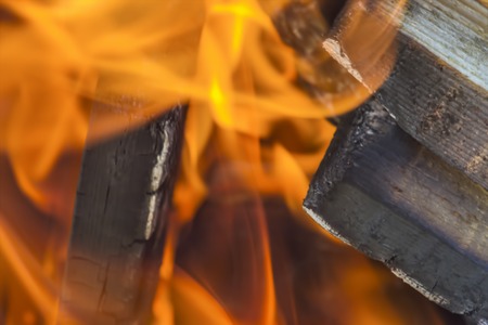 Burning firewood ready for barbecue close up