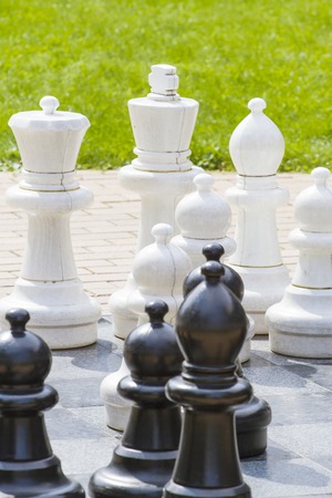 Outdoor giant chess board with big plastic piecesの写真素材