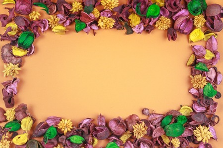 Dry flowers composition. Frame made of dried flowers and leaves. Top view, flat lay.の写真素材