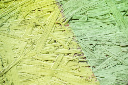 Green and greenery painted wood chipboard texture backgroundの写真素材