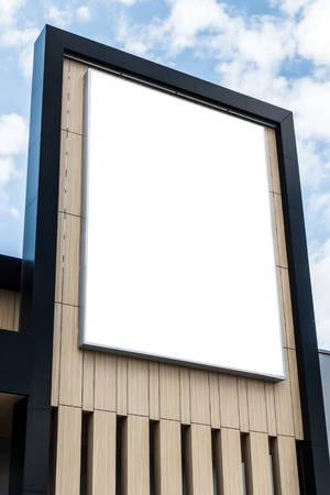 Mock up. Blank billboard on the wall of shopping center.の写真素材