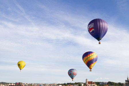 Vilnius, Lithuania - July 16, 2016: Hot air balloons flying over old city Vilnius, Lithuaniaのeditorial素材