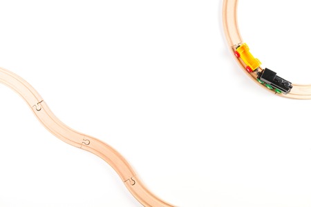 Toy train on round wooden railwaysの写真素材