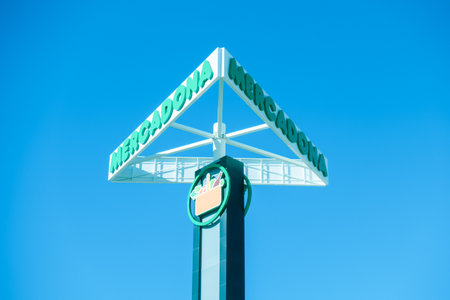 Finestrat, Spain- December 5, 2017: Mercadona signboard and logo over blue skyのeditorial素材