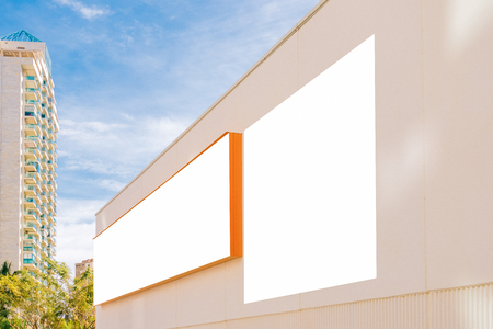 Mock up. Two big blank billboard outdoors, outdoor advertising, signboard on store wall.の写真素材