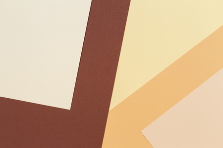 Abstract geometric paper texture cardboard background. Beige, brown yellow pastel colors