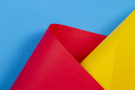 Abstract colorful background. Yellow red blue color paper in geometric shapesの写真素材