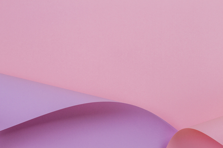 Abstract geometric shape pink violet purple color paper backgroundの写真素材
