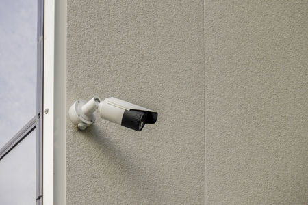 CCTV video camera security system on the wall of the building