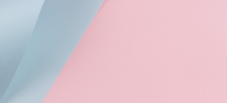 Abstract geometric shape pastel pink and blue color paper backgroundの写真素材