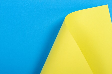 Abstract colorful background. Yellow blue color paper in geometric shapes