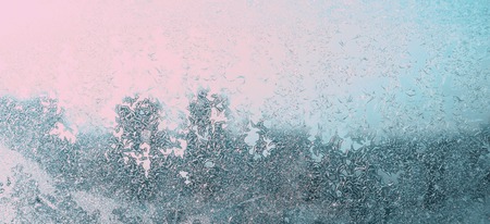 Winter background. Abstract banner background of ice frozen window glassの写真素材