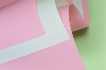 Abstract geometric shape pastel pink and green color paper backgroundの写真素材