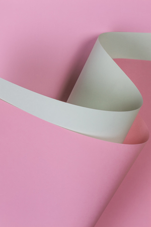 Abstract geometric shape pastel pink and green color paper backgroundの写真素材