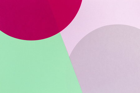 Abstract color paper background. Pastel pink, red and light green color round circle shape geometry composition. Top viewの写真素材