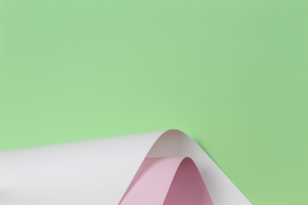 Abstract geometric shape pastel green pink and white color paper background.の写真素材