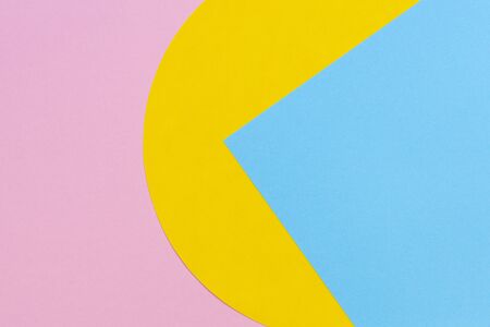 Texture background of fashion papers in memphis geometry style. Yellow, light blue and pastel pink...