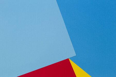 Abstract blue, red and yellow color paper geometry composition backgroundの写真素材