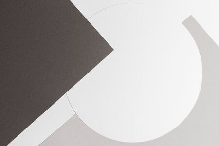 Abstract colored paper texture background. Minimal geometric shapes and lines in brown, gray, white...