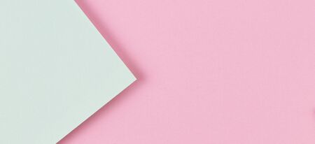 Abstract colored paper texture background. Minimal geometric shapes and lines in pastel pink and light green colours.の写真素材